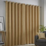 Strata Ochre Yellow Dim Out Eyelet Curtains