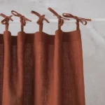 Tie top burnt orange linen Drapes